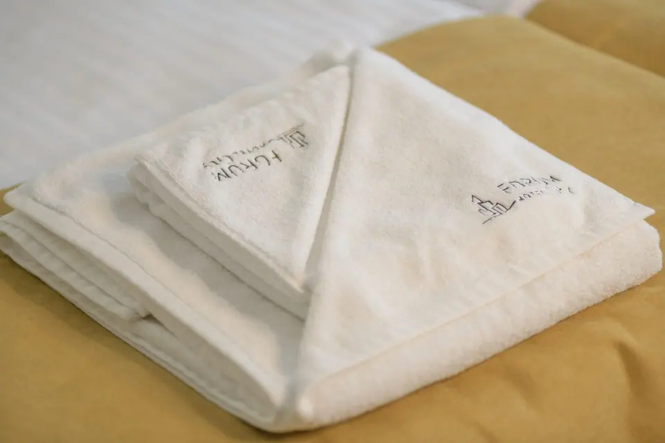Towels and bed linen with the hotel logo – Forum City Hotel, Pazardzhik