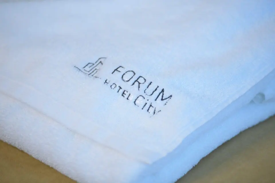 Towels and bed linen with the hotel logo – Forum City Hotel, Pazardzhik
