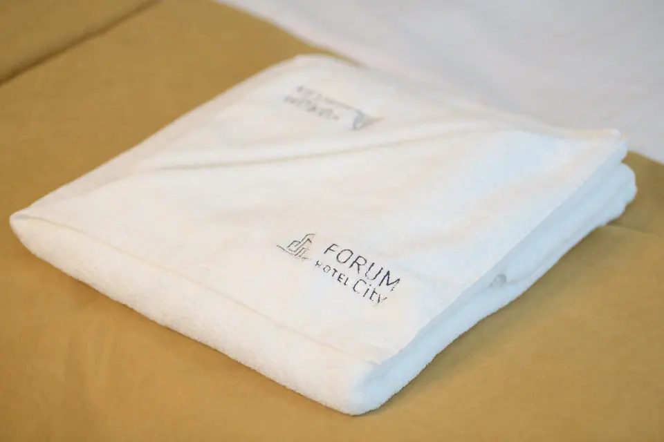 Towels and bed linen with the hotel logo – Forum City Hotel, Pazardzhik