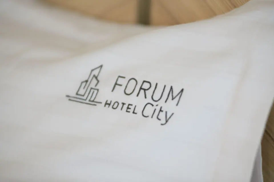 Towels and bed linen with the hotel logo – Forum City Hotel, Pazardzhik